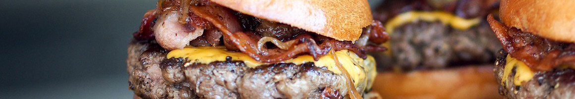 Eating Burger at Burger Basket restaurant in Norwalk, CA.